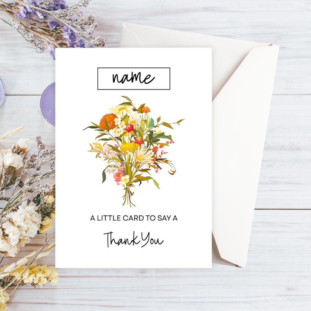 Greeting card with floral design and envelope on a wooden surface. Autumn Flowers Thank You Personalised Card