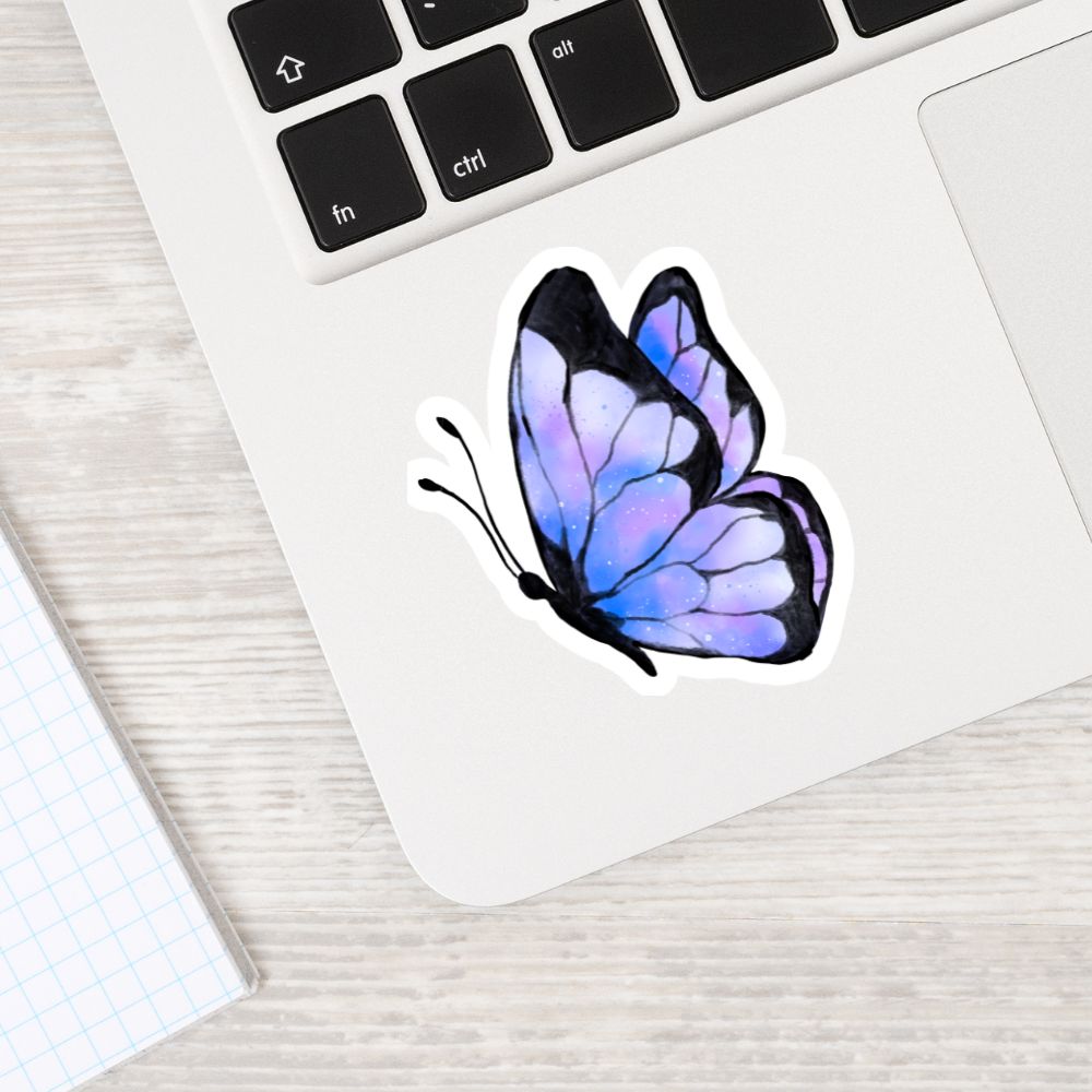 Butterfly sticker on a laptop keyboard. BUTTERFLIES STICKER