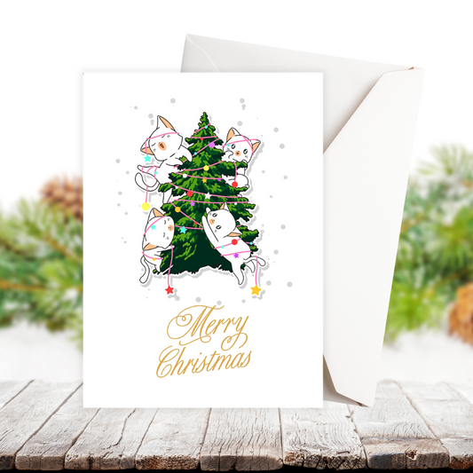 Christmas card with cats decorating a tree on a wooden surface with a snowy background. Cat Tree II Christmas Card