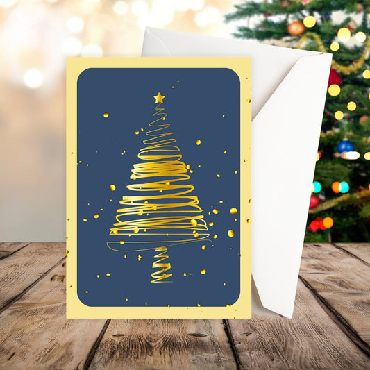 Greeting card with gold Christmas tree design on a blue background, with a blurred Christmas tree in the background.GOLDEN TREE WITH STARS CHRISTMAS CARD