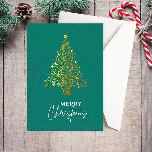 Christmas card with gold tree design on a green background, surrounded by festive decor.Golden Tree Christmas Card