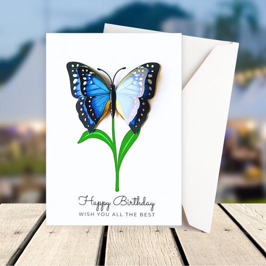 Greeting card with a blue butterfly design on a wooden surface