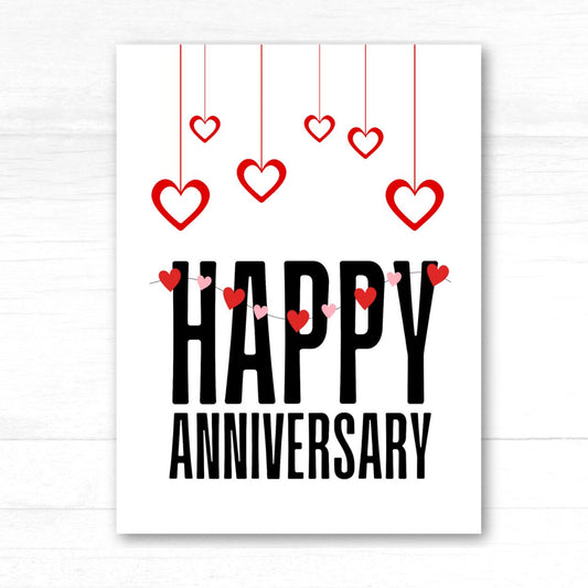 Card with 'Happy Anniversary' text and hanging hearts on a white background. Hearts Anniversary Card