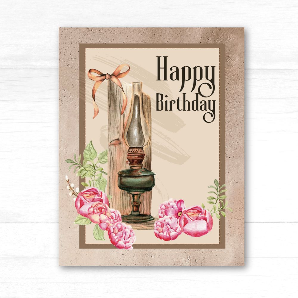 Vintage-style birthday card with oil lamp, flowers, and 'Happy Birthday' text on a textured background.