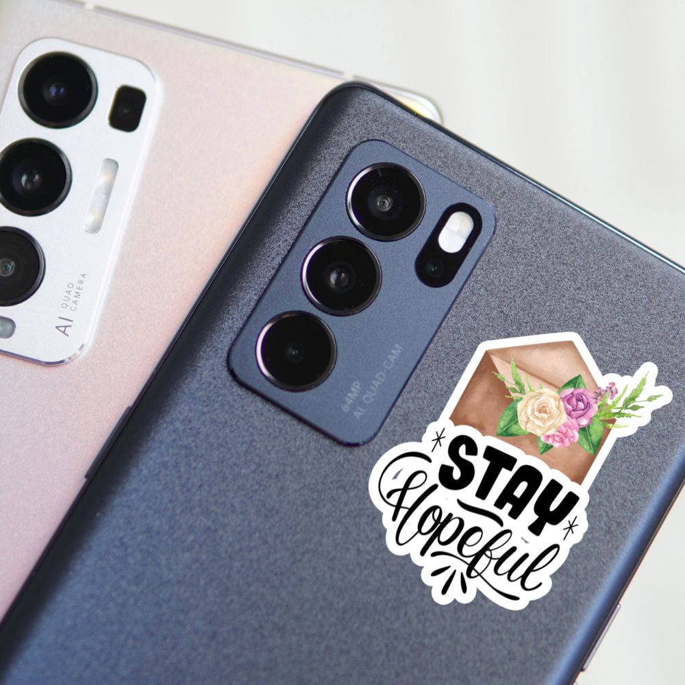 Phone case with 'Stay Hopeful' sticker and floral design on a phone. Motivational Quotes Sticker Sheet