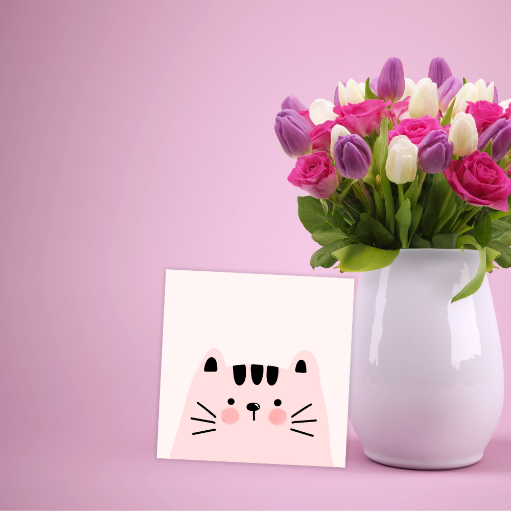 Bouquet of flowers in a white vase with a pink background birthday card