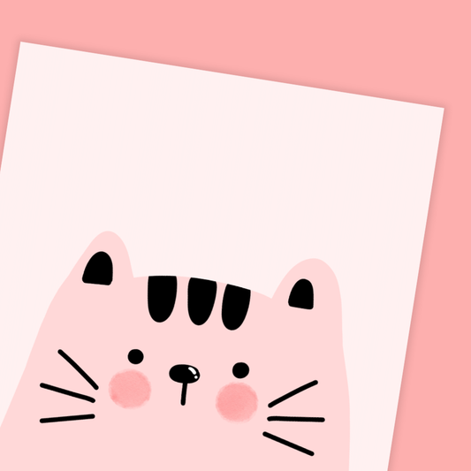 Cartoon cat face design on a white card with pink border birthday card