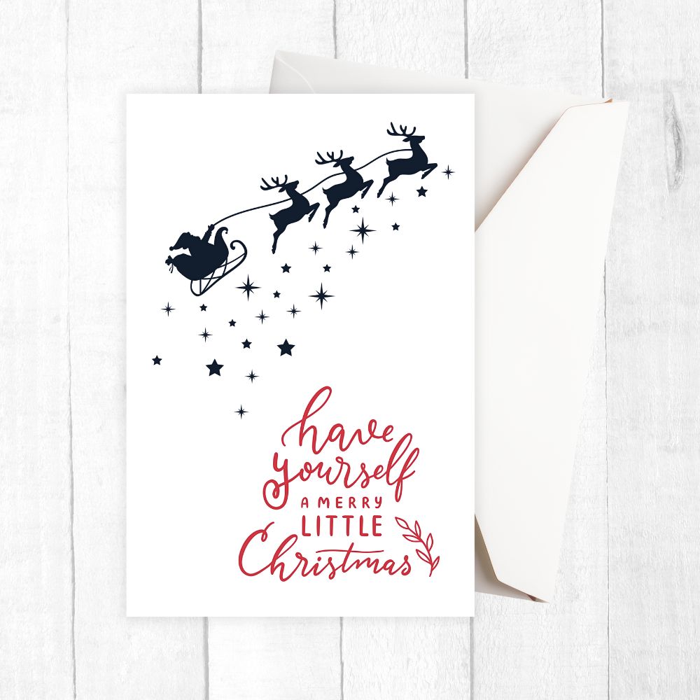Christmas-themed card with Santa and reindeer silhouette and red text on a white background. STARRY NIGHT CHRISTMAS CARD