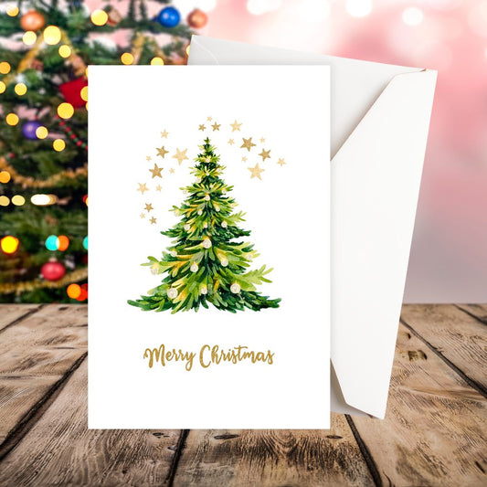Christmas card with a tree and 'Merry Christmas' text, blurred Christmas tree in the background. STARS & TREE CHRISTMAS CARD