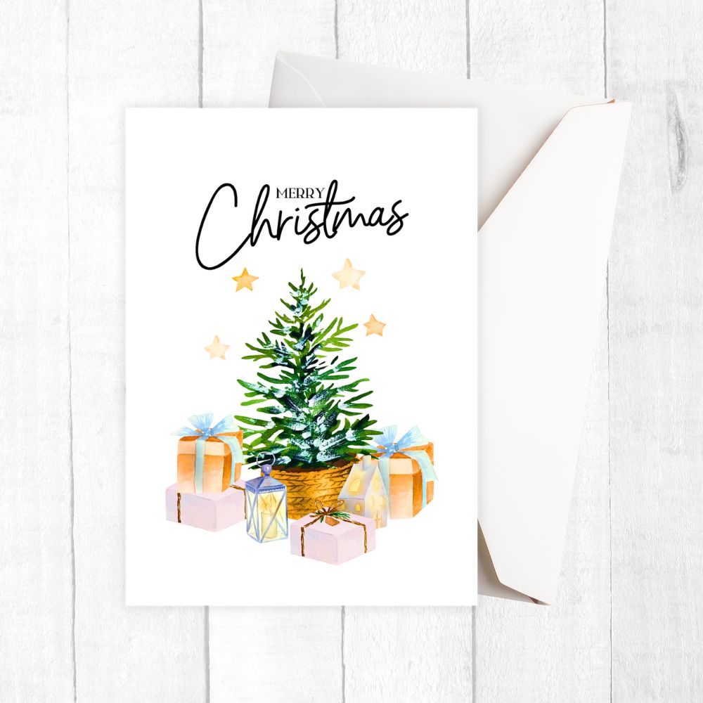 Christmas card with a small tree, presents, and 'Merry Christmas' text on a white background.TREE WITH GIFTS CHRISTMAS CARD