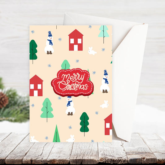 Christmas card with houses, trees, and snowmen on a beige background. VILLAGE CHRISTMAS CARD