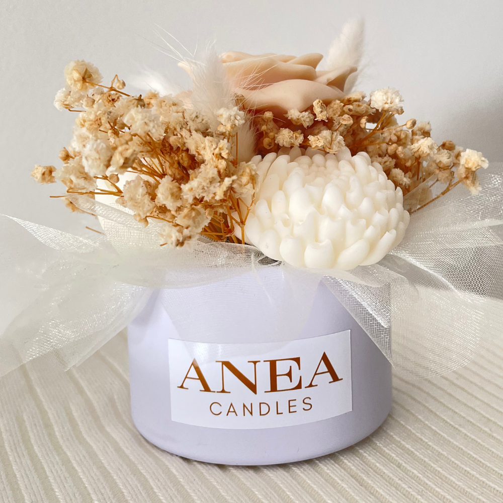 Anea candles with decorative flowers on a neutral background. CREAM WAX MELT FLOWER MINI BOUQUET