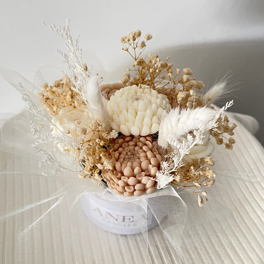 Decorative flower arrangement with dried elements on a white background. BROWN WAX MELT FLOWER MINI BOUQUET