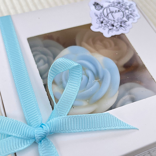 Gift box with a blue ribbon and soap flowers inside. roses WAX MELTS GIFT BOX