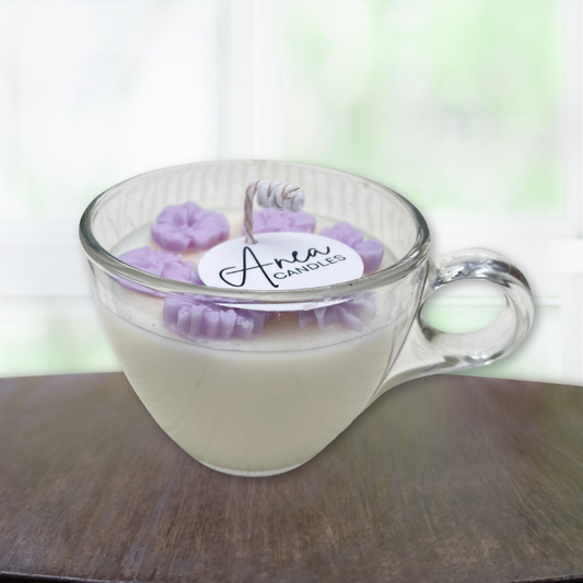 Clear glass mug with purple candle melts and 'Anea Candles' label on a wooden surface.Natural Coconut - Rapeseed Wax
Sandalwood Fragrance candle
