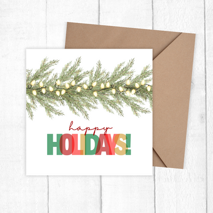 Christmas card with greenery and 'Happy Holidays!' text on a white background. 3D Happy Holidays Christmas Card