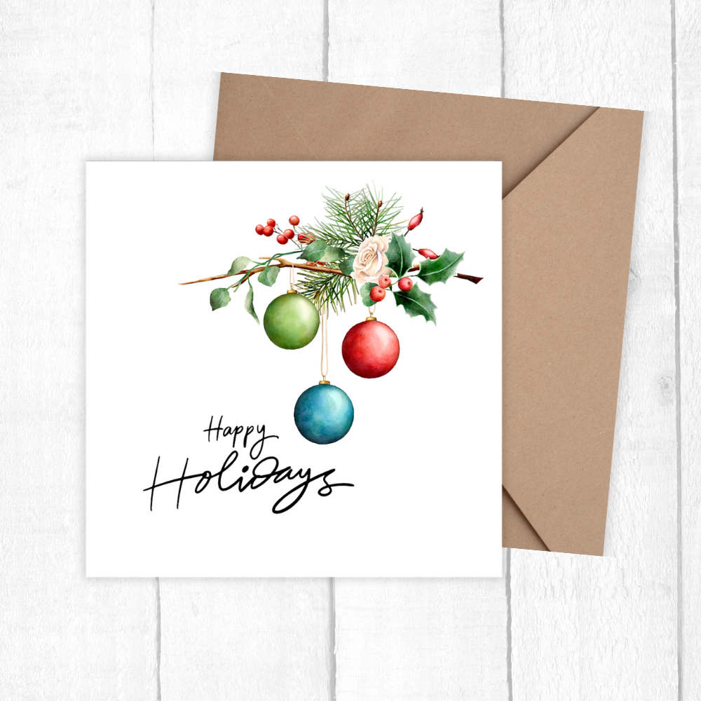 Greeting card with Christmas ornaments and 'Happy Holidays' text on a white background. 3D Holidays Bauble Christmas Card