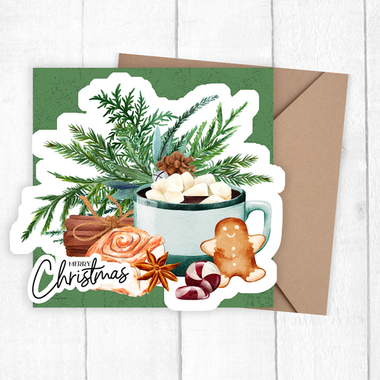 Christmas-themed card with a mug, gingerbread man, and festive elements on a green background.3D Hot Chocolate Christmas Card