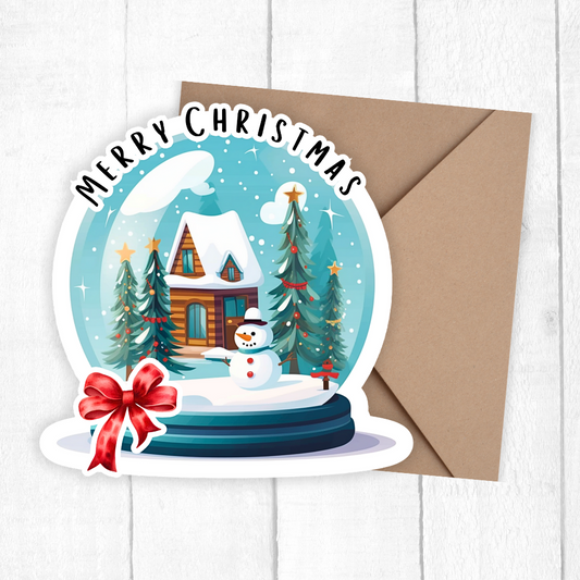 Christmas card with snow globe design, snowman, and trees on a white background
