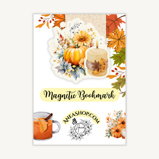 Autumn-themed magnetic bookmark with pumpkins, candles, and leaves on a white background.AUTUMN PUMPKIN AND CANDLE MAGNETIC BOOKMARK