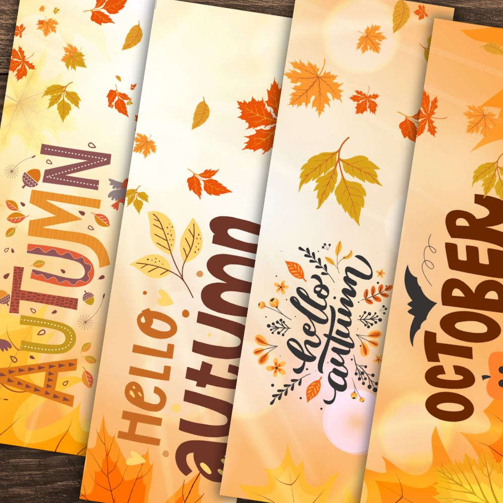 Five autumn-themed bookmarks with colorful leaves and text on a wooden surface.