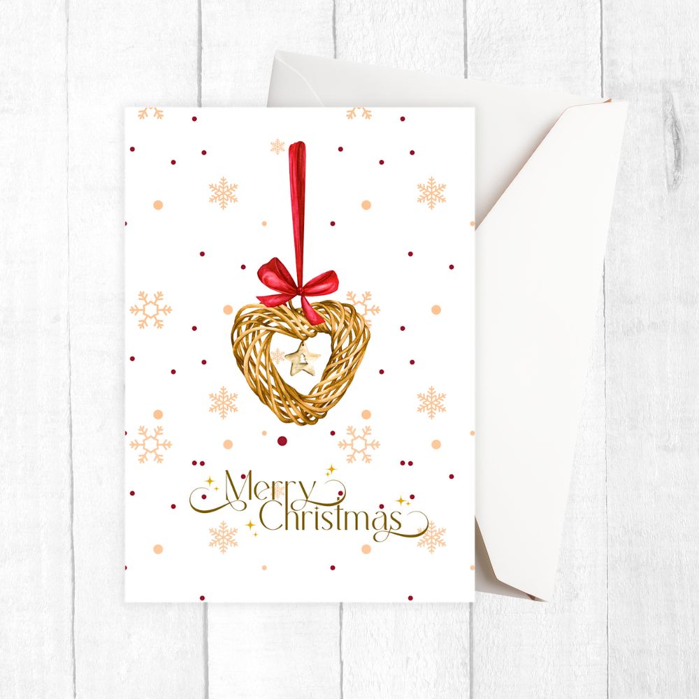 Christmas card with a heart-shaped wreath, red bow, and 'Merry Christmas' text on a white background.CHRISTMAS DECORATION CHRISTMAS CARD