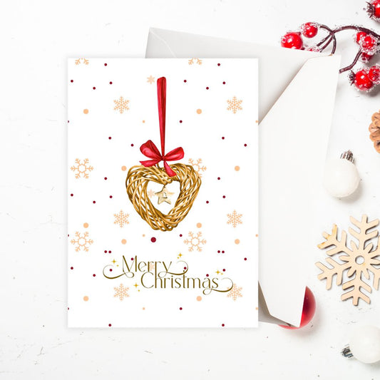 Christmas card with gold heart ornament and red bow on a white background. CHRISTMAS DECORATION CHRISTMAS CARD