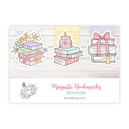 Three colorful magnetic bookmarks on a wooden background with 'Bookish' branding. CUTE BOOKS MAGNETIC BOOKMARK SET