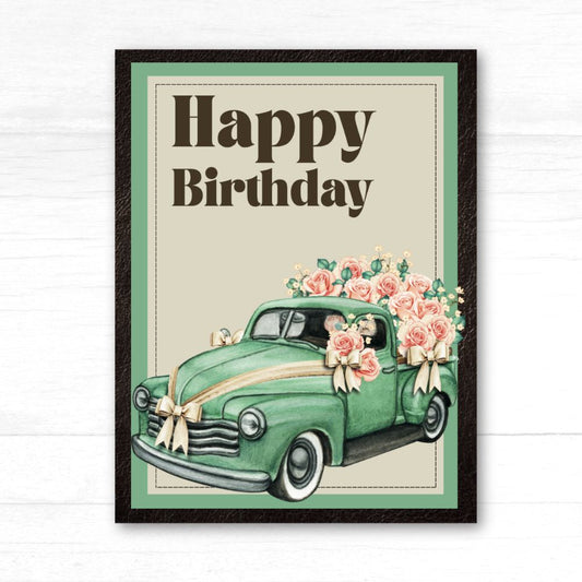 Framed birthday card with a vintage green car decorated with flowers and 'Happy Birthday' text. Car Vintage Happy Birthday Card