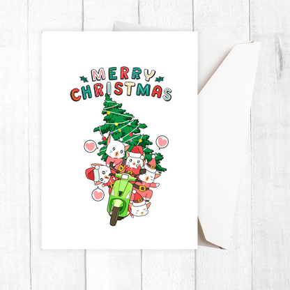 Card with cartoon cats on a scooter with a Christmas tree, featuring 'Merry Christmas' text. Cats on Motorbike Christmas Card