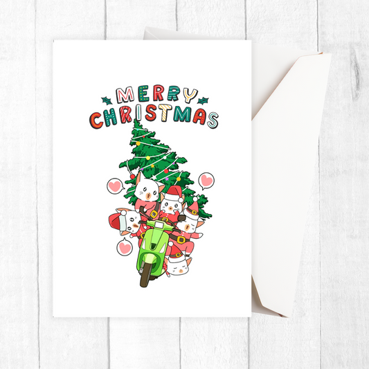 Card with cartoon cats on a scooter with a Christmas tree, featuring 'Merry Christmas' text. Cats on Motorbike Christmas Card