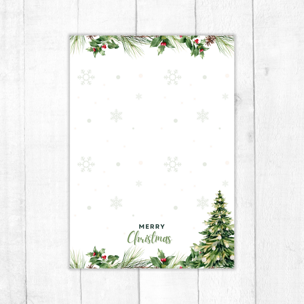 Christmas-themed card with decorative elements on a white wooden background. Christmas Tree Notepad A6