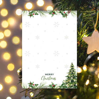 Christmas card with tree and 'Merry Christmas' text, surrounded by festive lights and decorations. Christmas Tree Notepad A6