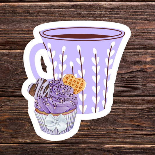 Sticker of a purple cup with a cupcake and waffle on a wooden background. Coffee and Blueberry Cupcake Sticker