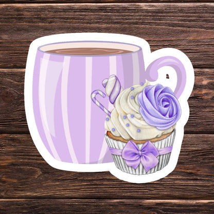 Sticker of a purple striped mug with a cupcake design on a wooden surface. Coffee with Creamy Lilac Cupcake Sticker