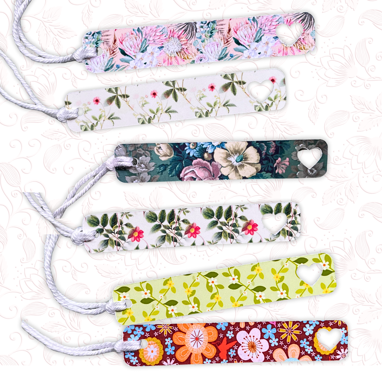 Set of floral-patterned bookmarks on a textured white background. FLORAL SLIM GIFT TAG SET 1