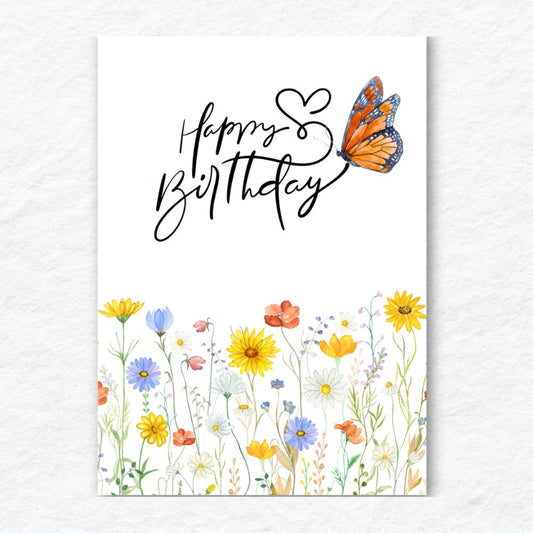 Happy Birthday card with colorful flowers and a butterfly on a white background. Flower Field Happy Birthday Card
