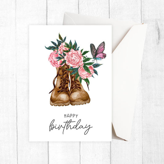 Greeting card with boots, flowers, and a butterfly on a white background. Flower Vintage Boots Birthday Card