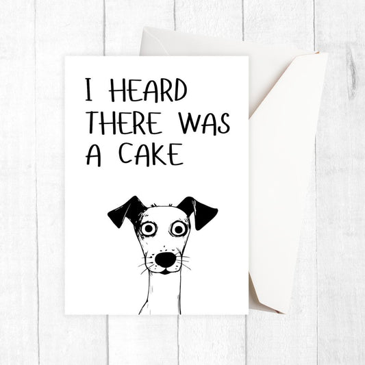 Cartoon dog with text 'I heard there was a cake' on a white background. Funny Dog Cake Birthday Card