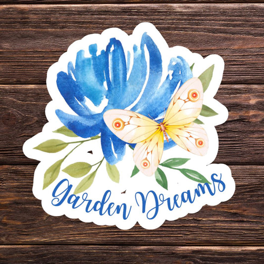Sticker with blue flower and butterfly design on a wooden background. Garden Dreams Butterfly Sticker