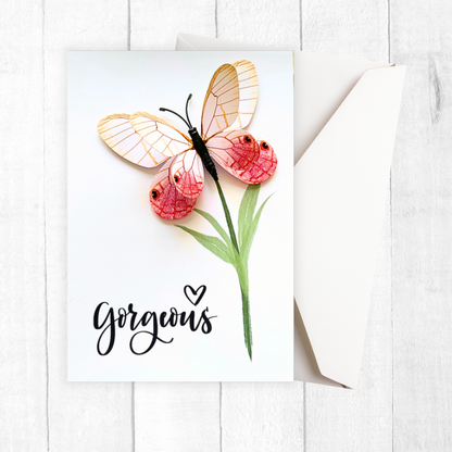 Butterfly and flower illustration with 'gorgeous' text on a white background. Gorgeous 3D Greeting Card