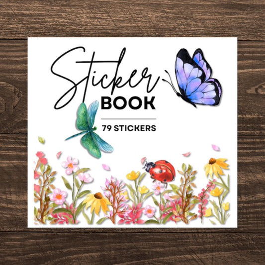 Sticker book cover with butterflies and flowers on a wooden surface. NATURE STICKER BOOK