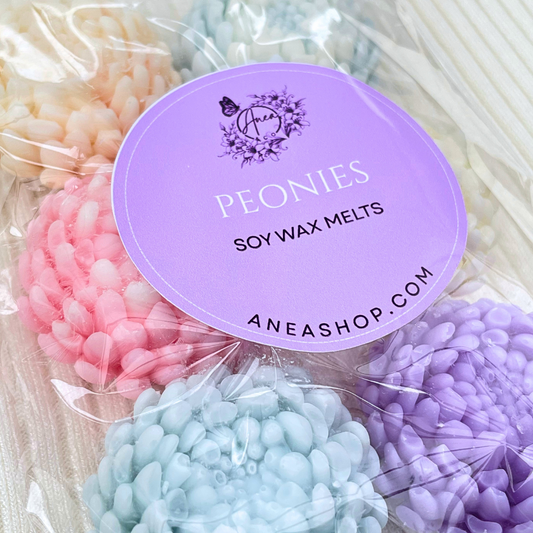 Packaged soy wax melts with a purple label displaying 'Peonies' and 'Aneashop.com'. PEONIES MIX WAX MELTS 