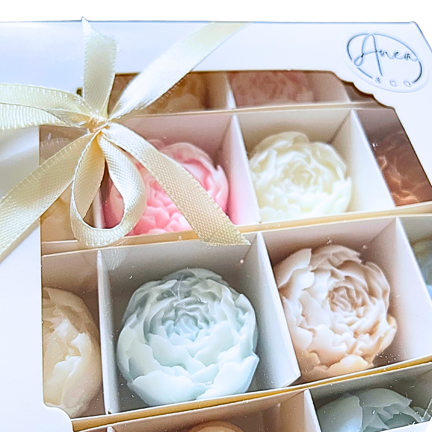Set of floral WAX MELTSbars in a decorative box with a ribbon, branded 'Ameri Soap'. PEONIES WAX MELTS GIFT BOX