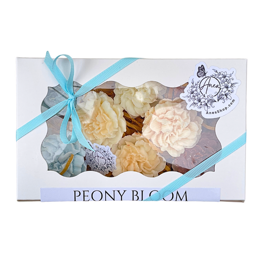 Gift box with 'Peony Bloom' soap set and a blue ribbon on a white background.PEONY BLOOM WAX MELTS GIFT BOX