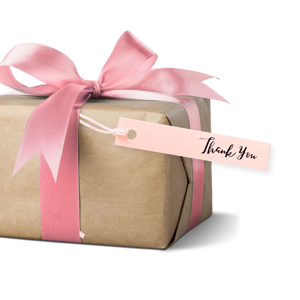 Gift wrapped in brown paper with a pink ribbon and 'Thank You' tag on a white background. PERSONALISED PASTEL SLIM GIFT TAG SET