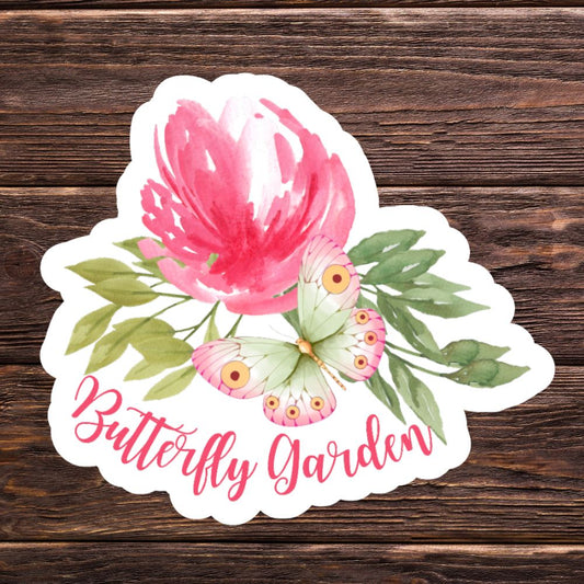 Sticker with pink butterfly and green leaves on a wooden surface. Peony and Butterfly Garden Sticker