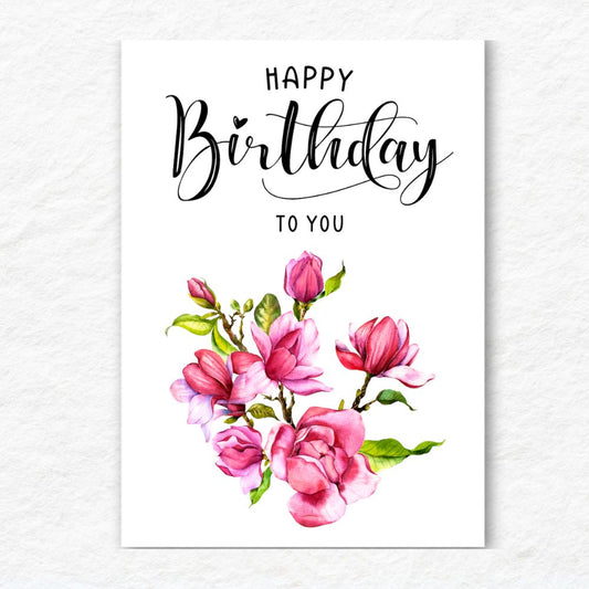 Happy Birthday card with pink flowers on a white background. Pink Magnolia Happy Birthday Card