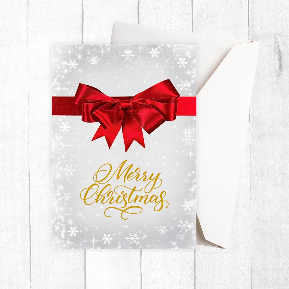 Greeting card with a red bow and 'Merry Christmas' text on a white background. RED RIBBON BOW CHRISTMAS CARD