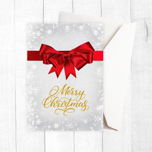 Greeting card with a red bow and 'Merry Christmas' text on a white background. RED RIBBON BOW CHRISTMAS CARD